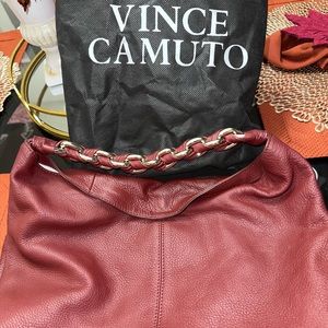 Burgundy Vince Camuto leather purse with leather and chain strap